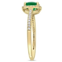 Donje prsten Miabella s smaragdu mekom rez T. G. W. u karatima i dragulj okrugli rez T. W. u karatima od žutog zlata